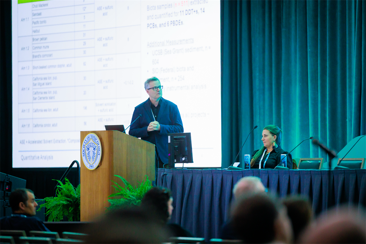 Man standing on a stage at 2026 SOT 